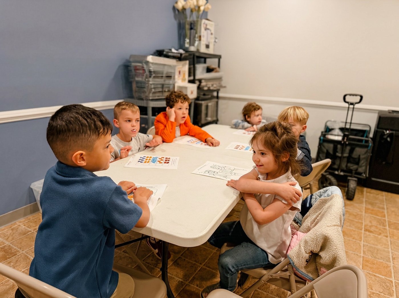 Kids gathered around a table during Sunday school at The Potter's House Stafford